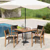 Stackable outdoor wicker dining chairs with acacia wood frame, placed by the pool for backyard dining.