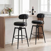 Set of 2 black swivel barstools with padded faux leather seats and curved backrests, ideal for modern kitchens or pubs.