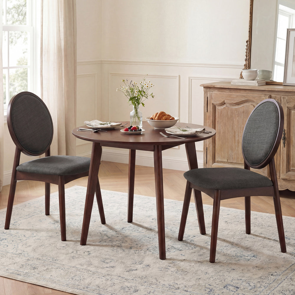 Set of 2 black upholstered linen fabric kitchen side chairs with padded seats, perfect for dining or living room use.