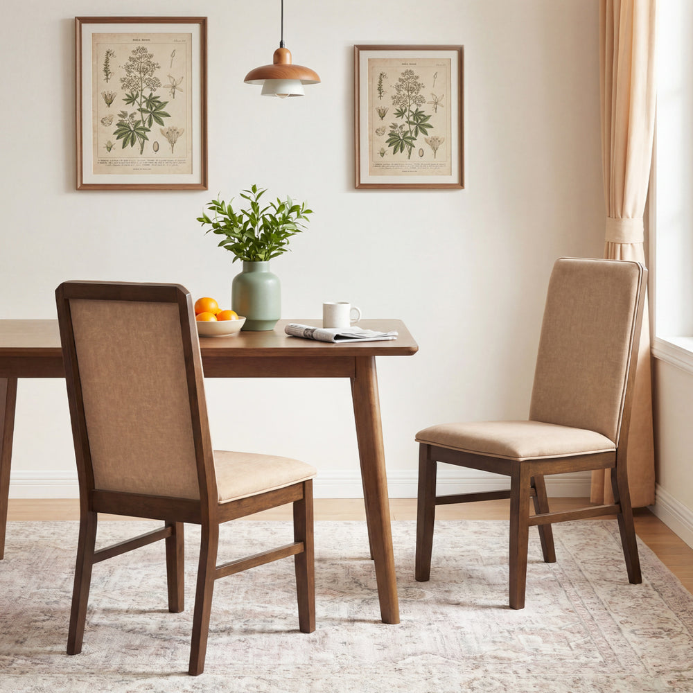 Upholstered dining chairs with solid rubber wood legs, featuring breathable linen fabric and high backrests for comfort.
