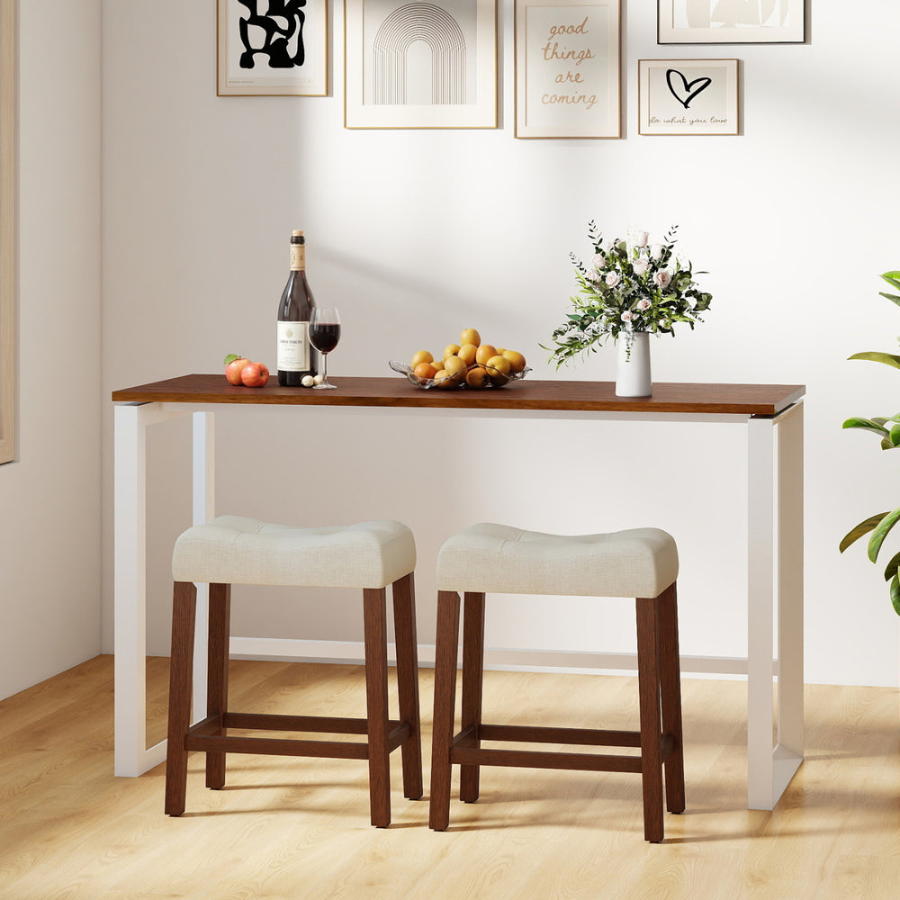 Upholstered counter height bar stools with curved saddle seats in brown, perfect for kitchen or bar use.
