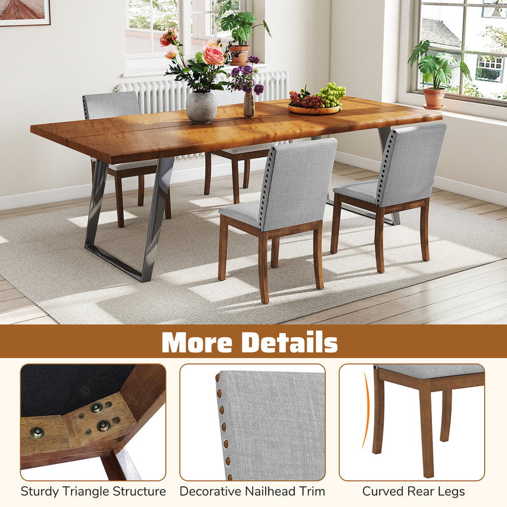 Upholstered dining chair with padded seat, walnut frame, decorative nailhead trim, ideal for elegant dining areas.