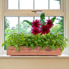 Wooden decorative raised garden bed with vibrant flowers and greenery, perfect for indoor or outdoor window displays.