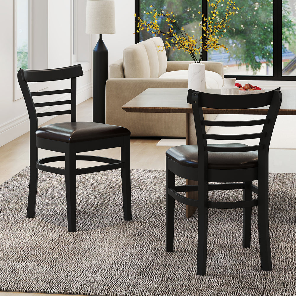 Set of 2 black wooden dining chairs with rubber wood legs and PU leather seats, perfect for restaurants and cafes.