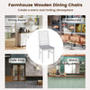 White wooden dining chair with rubber wood legs, padded seat, and ladder back design for dining rooms and cafes.