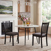 Two black wooden dining chairs with padded seats and rubber wood frames, perfect for kitchens and dining rooms.