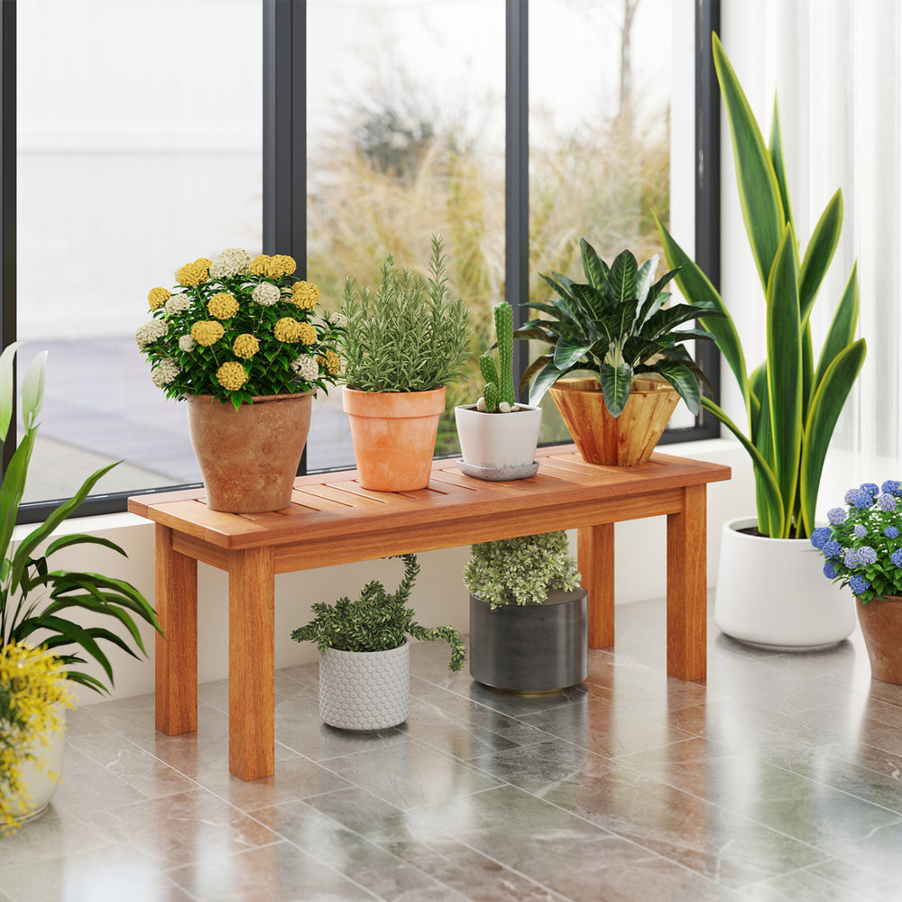 Wooden plant stand in brown finish, ideal for garden or entryway, showcasing vibrant potted plants for indoor and outdoor appeal.