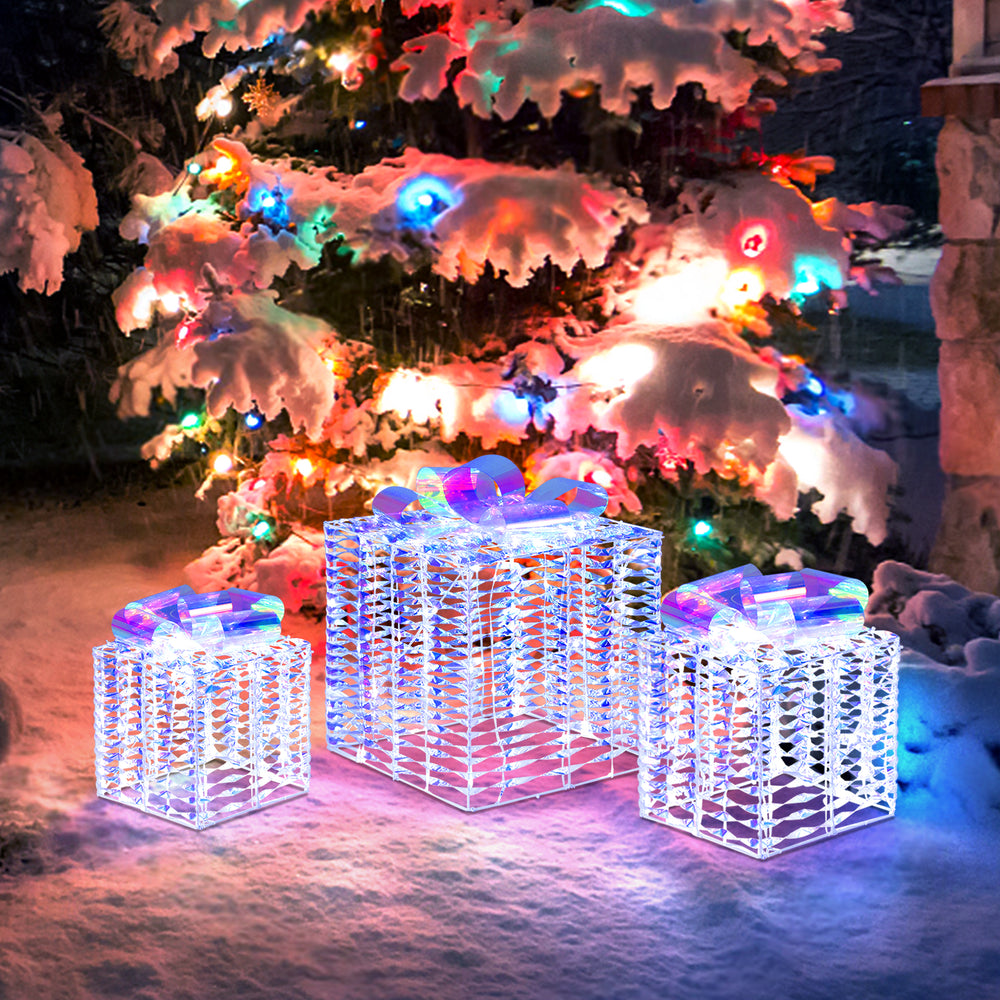 Set of 3 iridescent Christmas gift boxes with bows, illuminated by 156 cold white lights, perfect for outdoor.