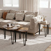 Nesting coffee tables with engineered wood tops and metal frames in rustic brown, perfect for versatile living room setups.