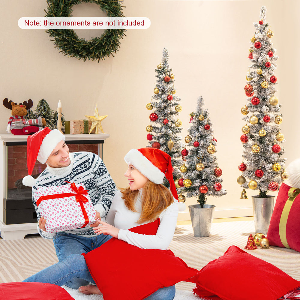 Set of 3 potted artificial Christmas trees with snowy flocked tips, perfect for small spaces and festive decor.