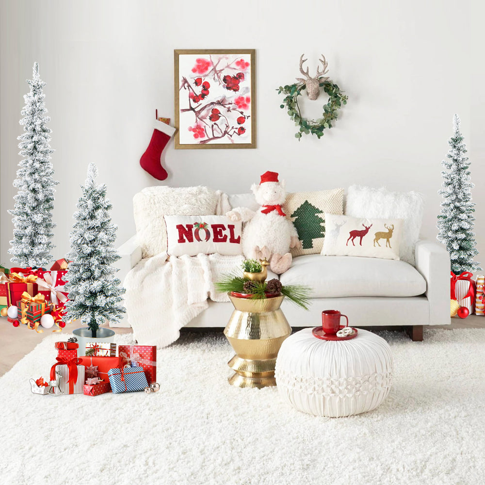 Set of 3 snow-flocked artificial Christmas trees in metal buckets, perfect for festive corner decorations.