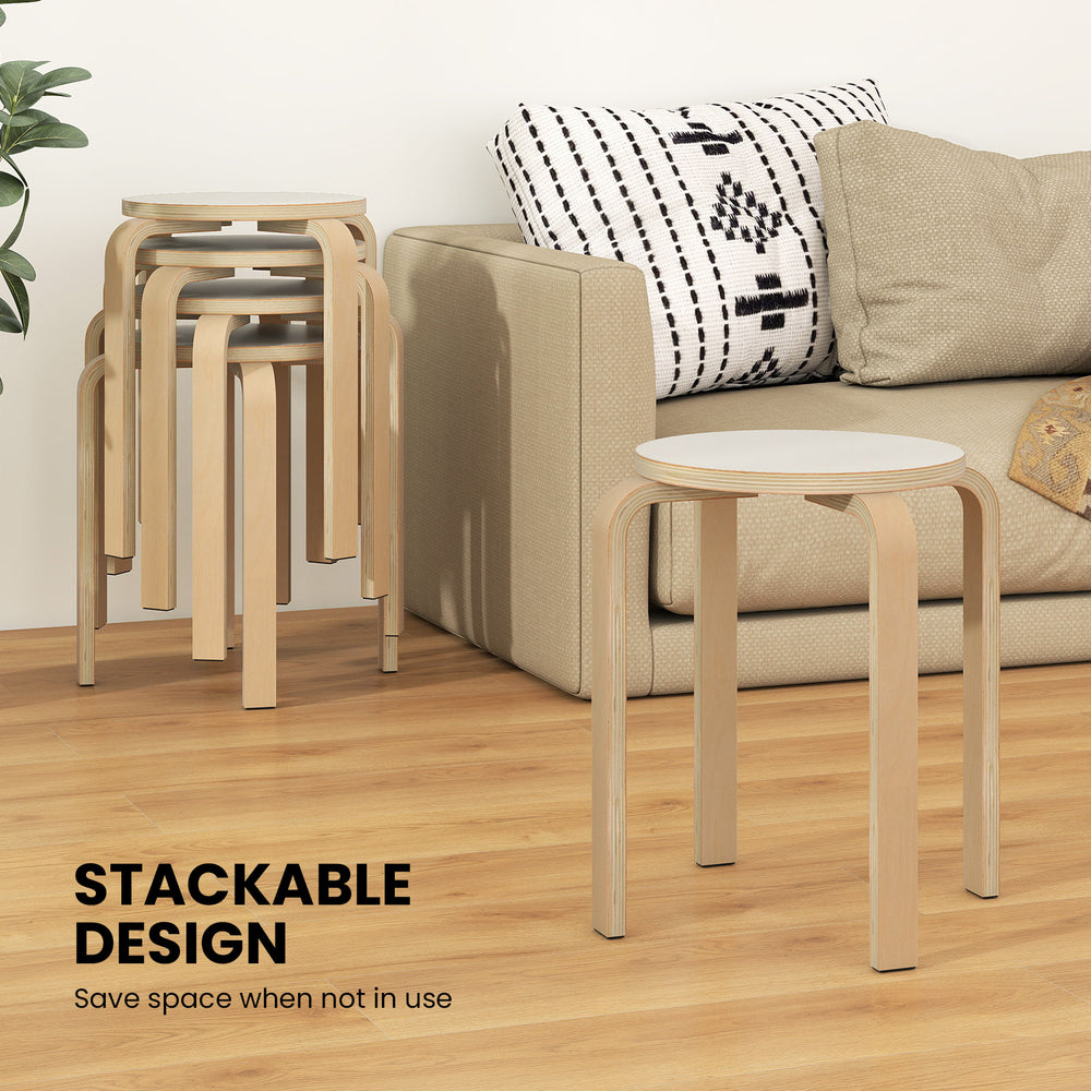 Set of 4 stackable bentwood dining chairs with round white tops, ideal for space-saving in home or office settings.