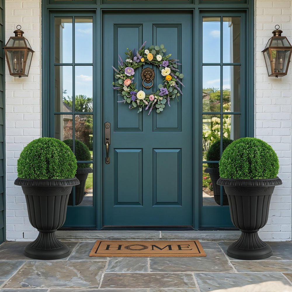 Black vintage planter with pedestal base, 18 inches tall, perfect for indoor and outdoor use on porches or weddings.