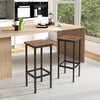 Rustic brown bar stool set with metal legs, featuring ergonomic footrests, ideal for kitchen islands or dining rooms.