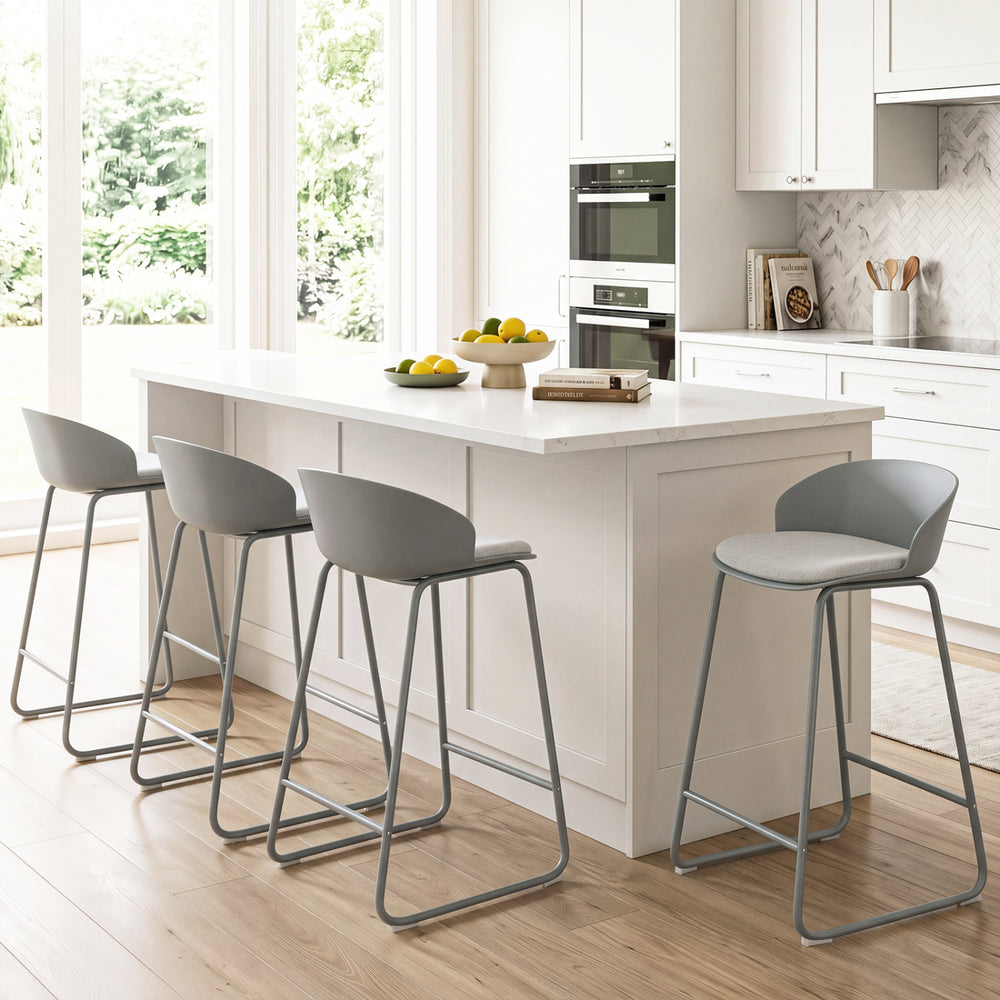 Set of 4 gray counter height bar stools with curved backrest and sturdy metal frame, ideal for kitchen dining.