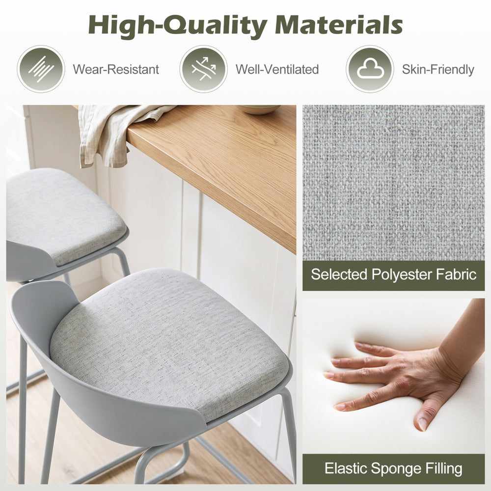Gray counter height bar stool set with curved backrest, metal frame, and wear-resistant polyester fabric for kitchen dining.