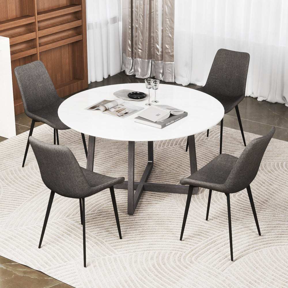 Set of 4 gray dining chairs with padded backs and metal legs, designed for comfort and stability in dining spaces.