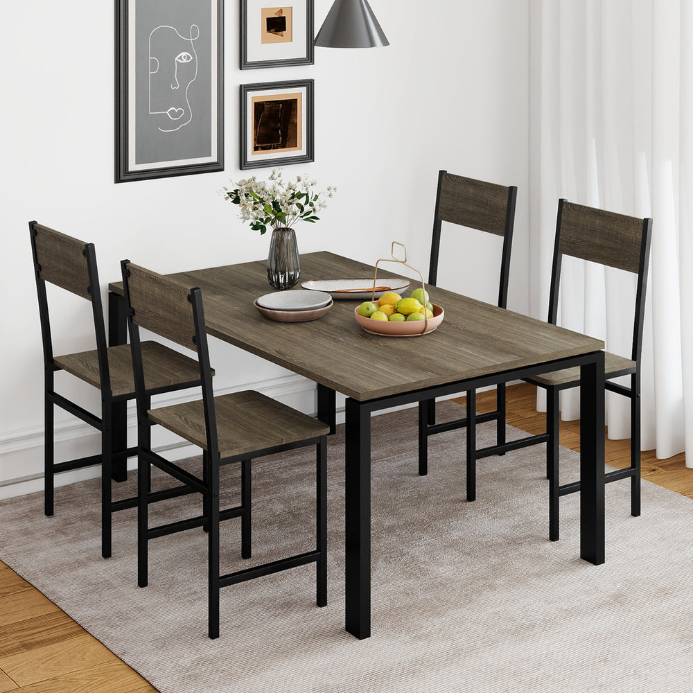 Set of 4 gray dining chairs with metal legs and slanted backrest, designed for comfort and stability in dining spaces.