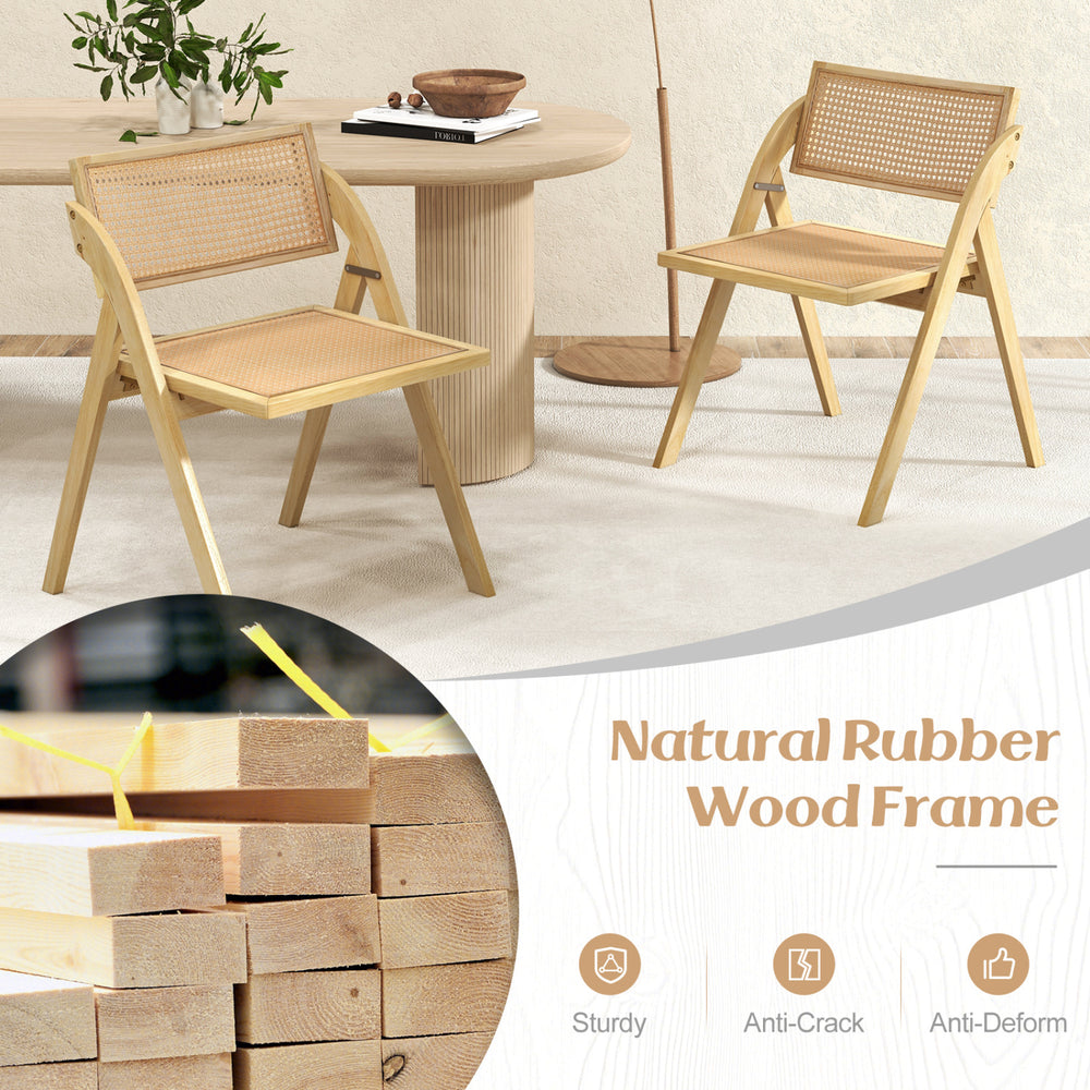 Set of 4 foldable dining chairs with woven rattan backrest and sturdy rubber wood frame for convenient storage.