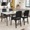 Set of 4 black folding dining chairs with padded seats and high backrests, perfect for stylish and comfortable dining.
