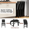 Set of 4 black folding dining chairs with padded seats, high backrests, and flexible hinge system for easy storage.