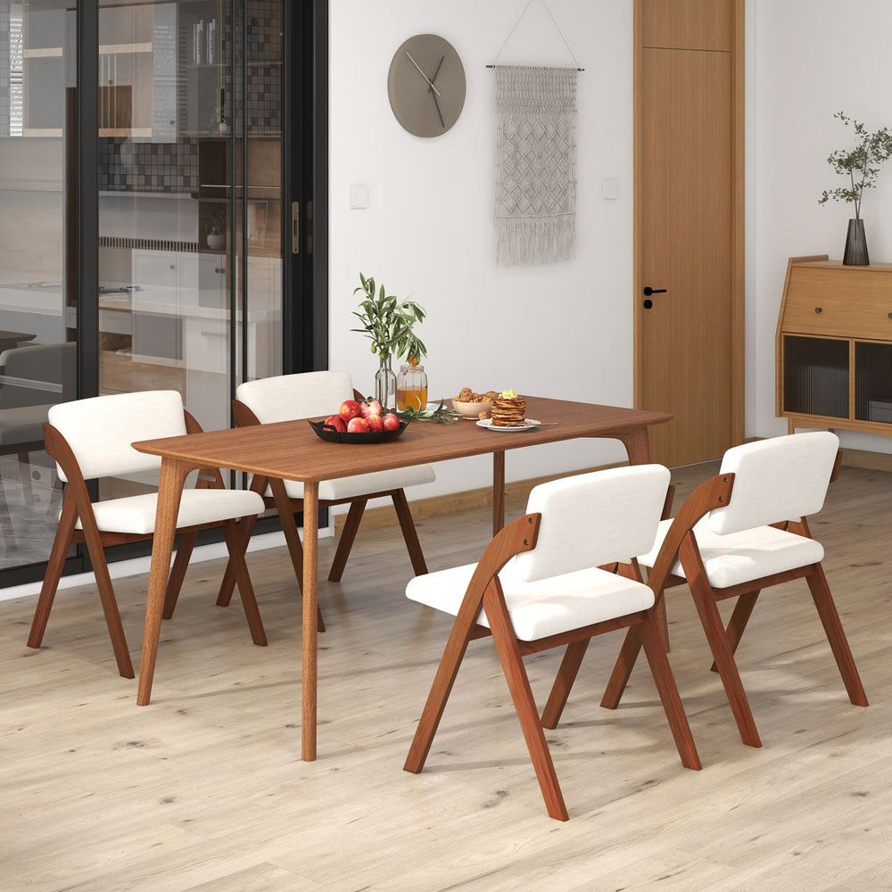 Set of 4 folding kitchen dining chairs with rubber wood legs in walnut finish, arranged around a dining table.
