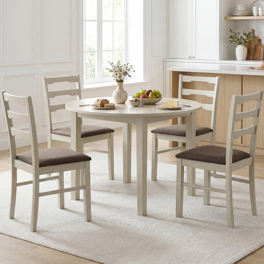 Set of 4 white ladder back dining chairs with linen-style upholstery, perfect for modern farmhouse dining spaces.
