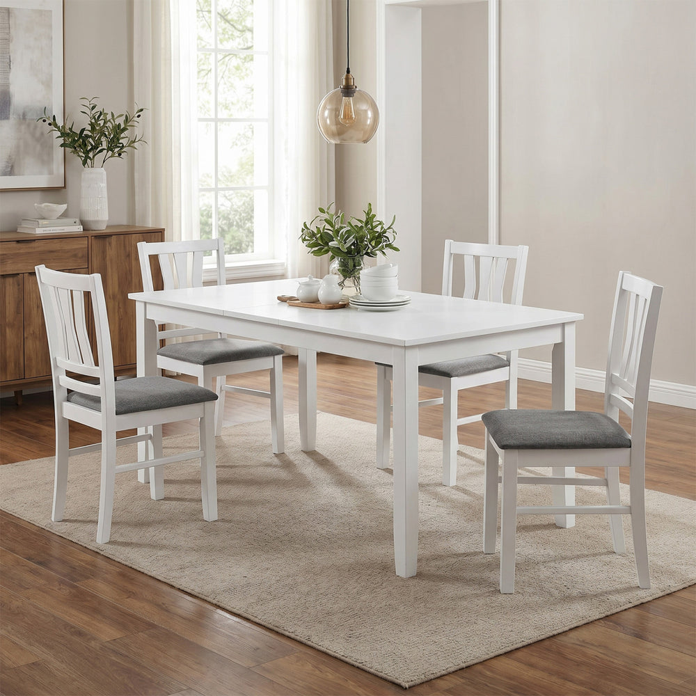 Set of 4 white kitchen chairs with linen-style upholstery and rubber wood frames, perfect for modern dining spaces.