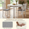 Set of 4 white kitchen chairs with linen-style upholstery and slatted backrest for comfortable dining experiences.