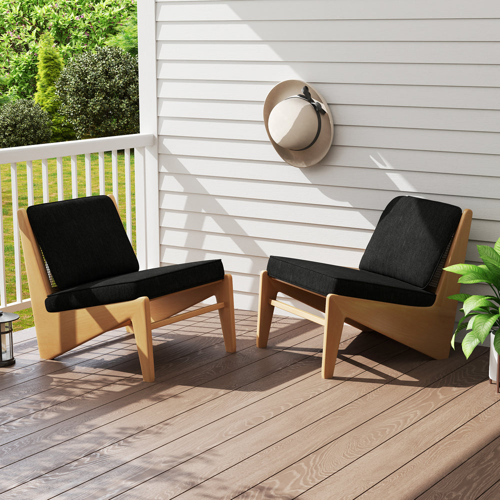 Set of 4 black outdoor patio cushions with removable covers, featuring breathable fabric for comfort and durability.