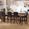 Set of 4 PVC leather bar stools with solid wood legs, featuring a comfortable upholstered seat, ideal for kitchens and.