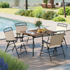 Beige patio folding chair showcasing curved armrests and a sturdy design, perfect for comfortable outdoor dining.
