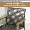 Wicker dining chair with acacia wood armrests, designed for outdoor use and stability, perfect for backyard or poolside.