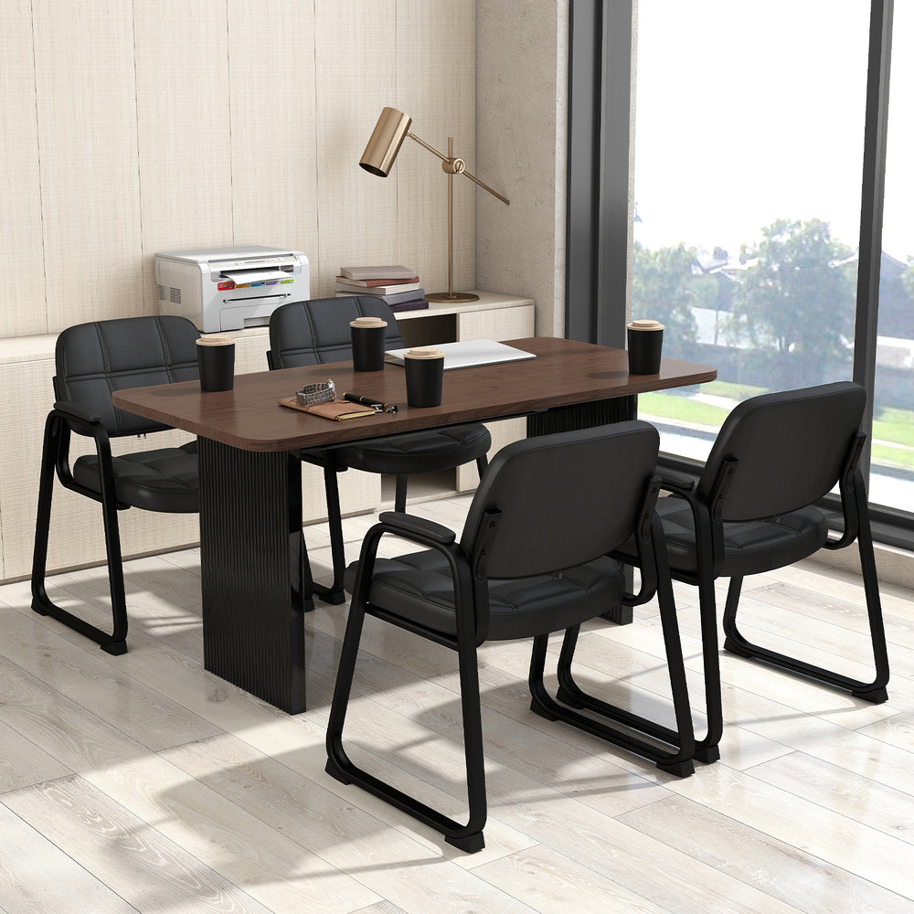 Set of 4 black upholstered waiting room chairs with armrests and ergonomic backrests, ideal for office or dining use.