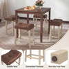Counter height bar stool set with curved saddle seats, tufted design, and non-slip foot pads for kitchen or bar use.