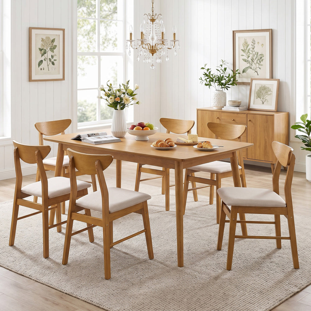 Set of 4 upholstered dining chairs with curved backrest and rubber wood frame, perfect for dining and kitchen settings.