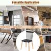 Set of 4 black Windsor dining chairs with spindle backs, ideal for kitchen and dining room use, featuring sturdy beech.