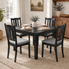 Set of 4 black wooden dining chairs with soft-padded cushions and ergonomic hollow backs for comfortable seating.