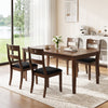 Set of 4 walnut wooden dining chairs with padded seats and ergonomic backrests, perfect for dining rooms and kitchens.