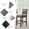 Stylish counter height chair featuring a durable rubber wood frame, linen fabric, and decorative rivets for added.