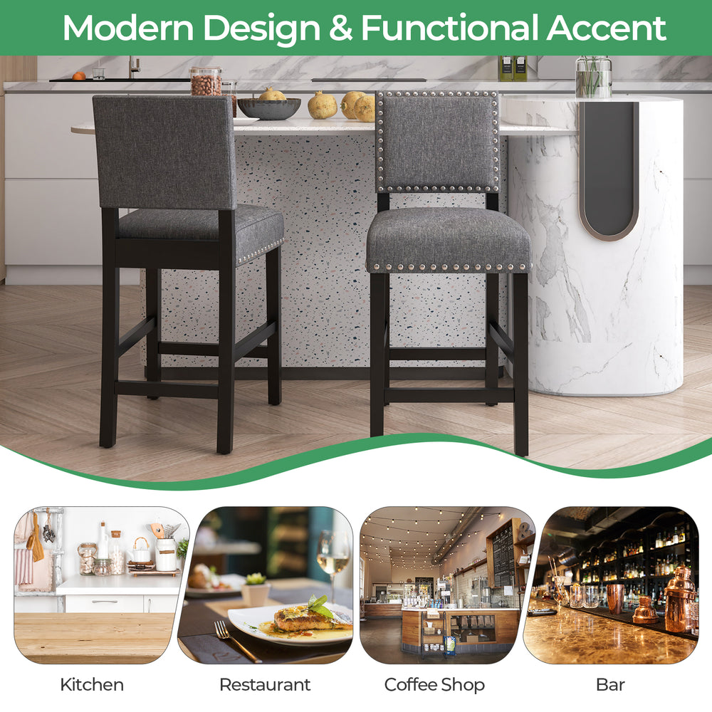 Set of 2 counter height chairs with solid rubber wood frame, cushioned seats, and decorative rivets for kitchen or bar.