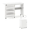 Folding sewing machine table in white with charging station, 3-tier shelf, and lockable casters for versatile use.