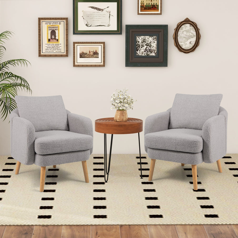 Grey Sherpa accent chairs with wooden legs and cushions, perfect for modern living room decor.
