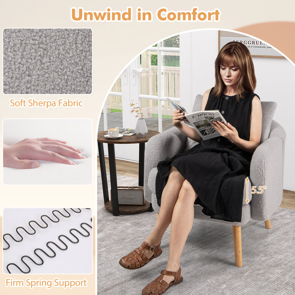 Sherpa accent chair in grey with thick seat cushion, curved backrest, and solid rubber wood legs for modern living.