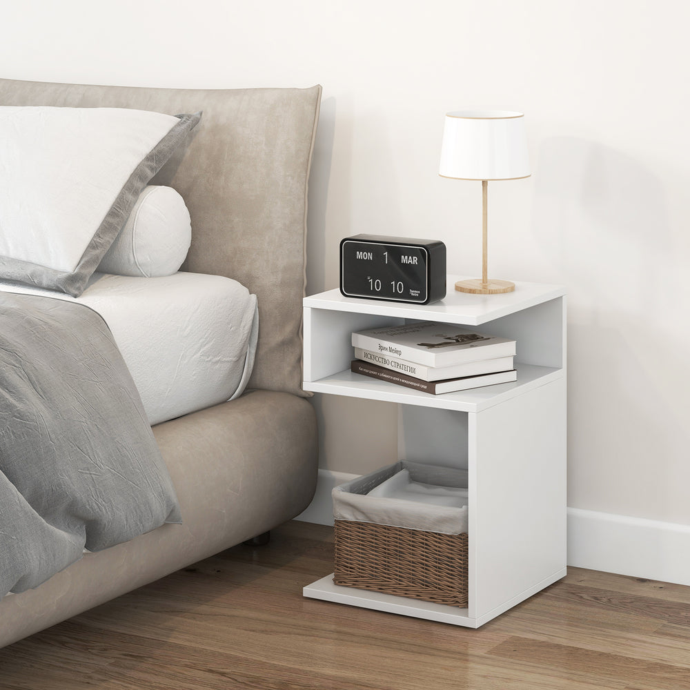 S-shaped side table in white with a smooth waterproof surface, ideal for placing a lamp and decorative items.