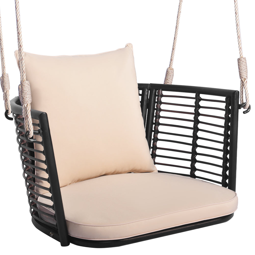 Single person hanging seat with woven rattan backrest and soft cushions, perfect for backyard relaxation.