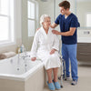 Sliding tub transfer bench with detachable armrests, adjustable height, and safety features for elderly and disabled users.