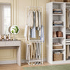 Freestanding slim coat rack with 8 hanging rods and detachable pants hangers, perfect for organizing clothing in small.