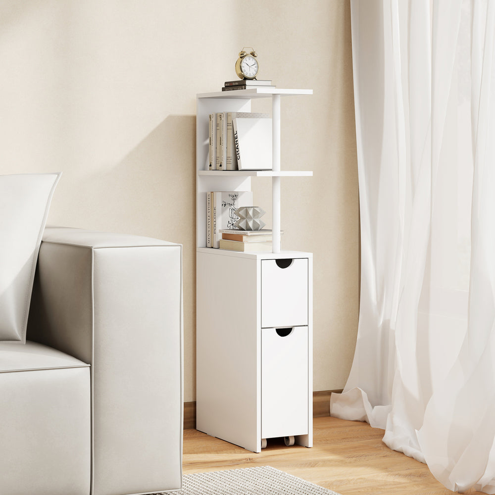 Slim white storage cabinet with open shelves and a pull-out drawer, perfect for space-saving in bathrooms or living.