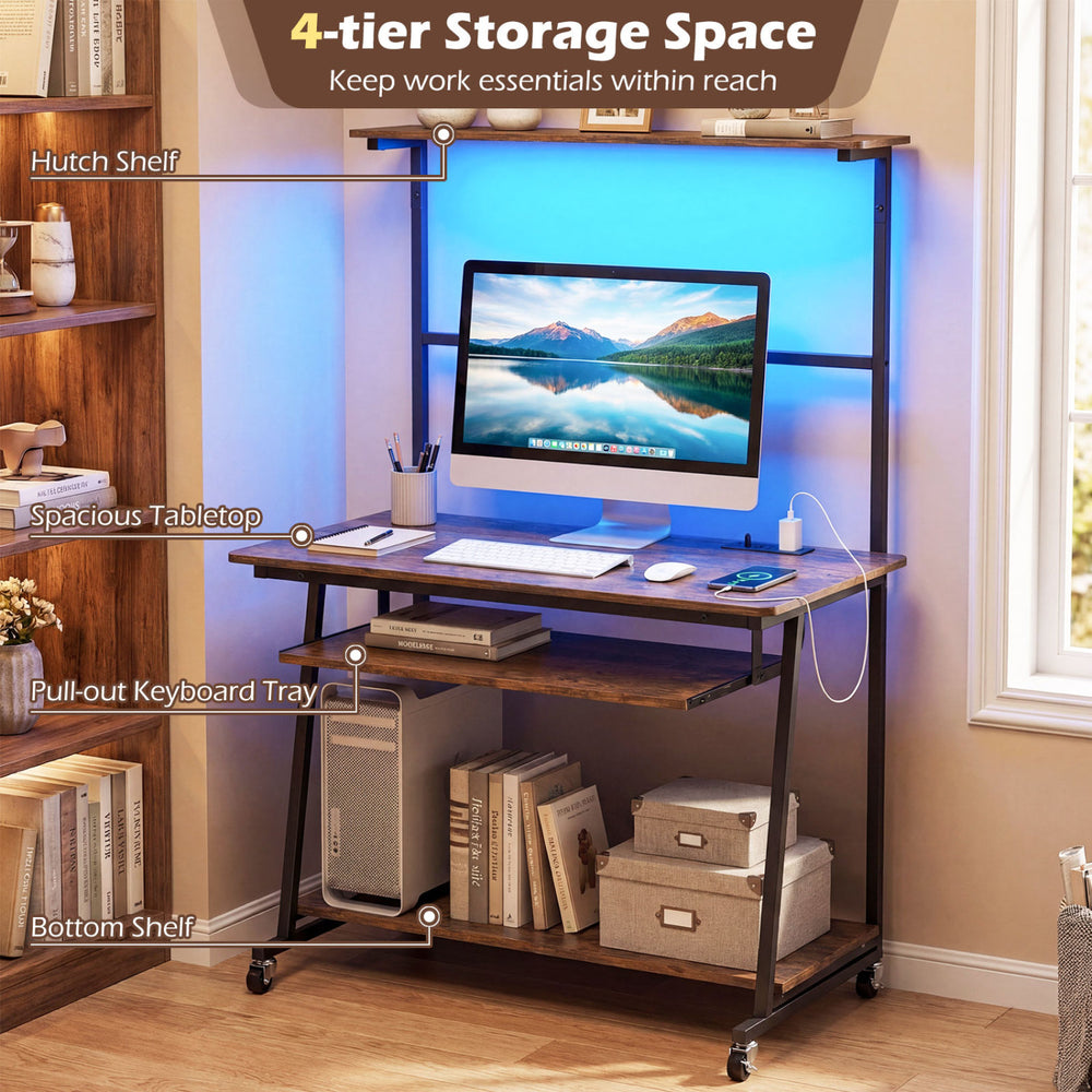 Small computer desk in rustic brown with LED lights, charging station, and 4-tier storage for home office use.